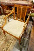 Edwardian Sheraton-style satinwood library elbow chair, the square-shaped back with dentil inlay,