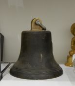 Brass ship's bell of plain form (missing clapper),