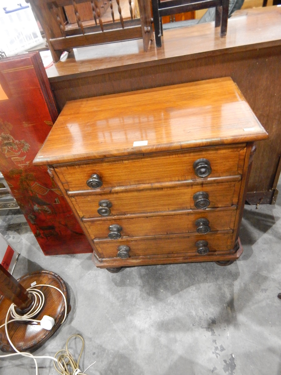 Mahogany chest of four short dummy drawers to reveal commode, and lid,