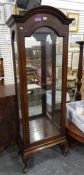 Glass panelled display cabinet with domed top,