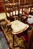 Two hardwood elbow chairs with rail backs and two others (4)