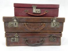 Red leather writing suitcase with fitted interior and two small brown leather suitcases (3)