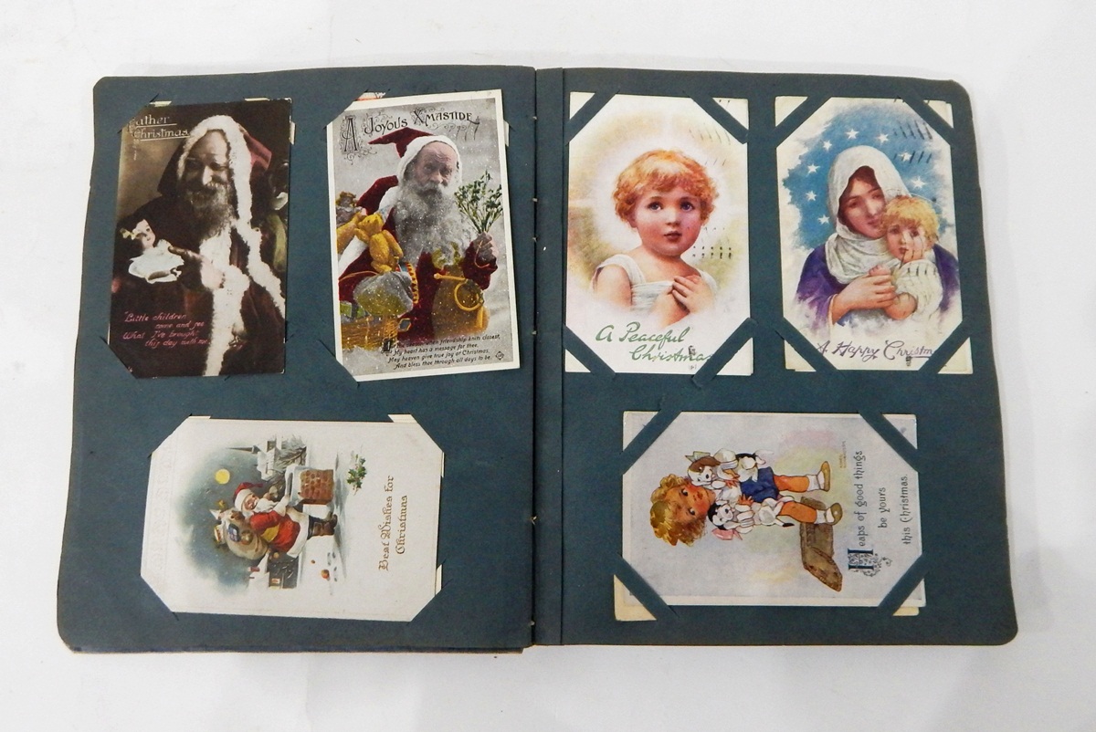 Two postcards albums and contents of mainly topographical and humorous cards,