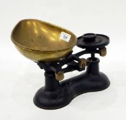 Pair of Victor balance scales with set of circular ounce weights and a set of square grams weights,