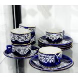 Set of six continental coffee cups and saucers,