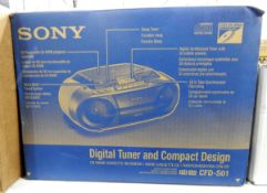 A Sony digital tuner and compact design CD radio cassette recorder in original box plus some