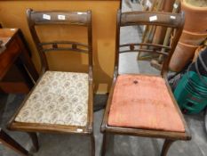 Pair of reproduction dining chairs on sabre supports