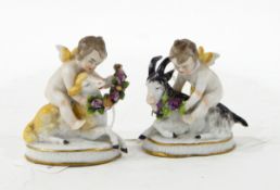 Pair of Staffordshire flatback spill vases moulded castles with floral decoration, clock,