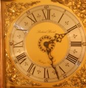 A reproduction mahogany longcase clock, the hood with swan neck pediment,