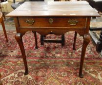 18th century oak side table, single frieze drawer with loop handles, shaped apron,