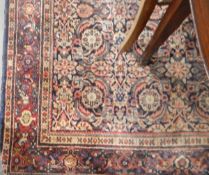 A large Eastern wool rug,