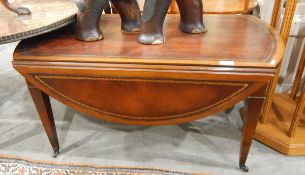 Fall-flap coffee table with tooled leather inset top