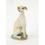 Porcelain model of a seated whippet, on oval base with gilt rim, the base signed "Basil Matthews",