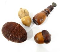 Carved coquilla nut of ovoid form with geometric band decoration,