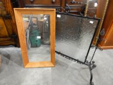 Pine mirror and glazed fire screen with wrought iron frame
