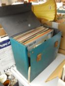 DVD player in original box and a quantity of long playing and 45rpm records,