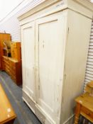 An early 20th century white painted pine wardrobe fitted two drawers to base,