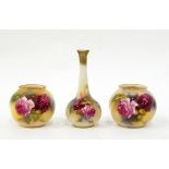 A pair of Royal Worcester vases of globular form, painted with roses on an ivory ground, 7.