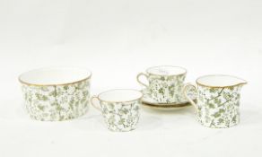 Victorian Wedgwood part tea service of fluted form, decorated with green flowers, on a white ground,