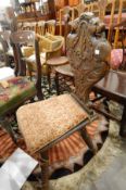Victorian oak hall chair with lion, floral and scroll carved,