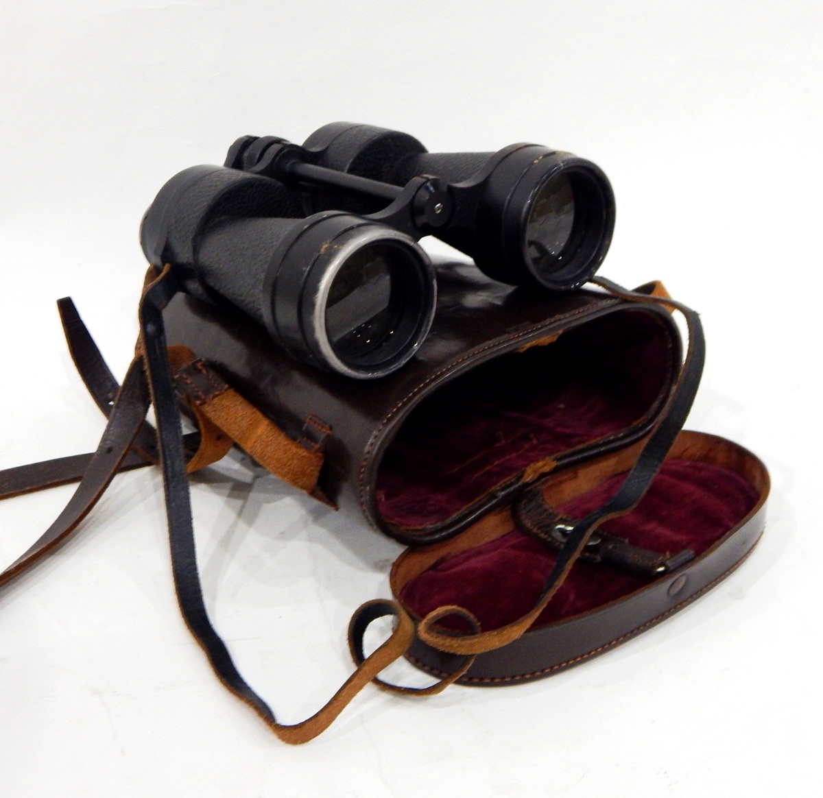 Pair of Ross of London Stepmur 10x50 binoculars in leather case, a pair of Prinz binoculars,