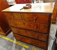 Antique walnut chest of two short and three long graduated drawers,