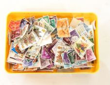 Six plastic boxes of stamps, worldwide,