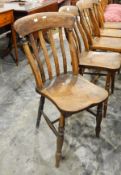 Set of five elm kitchen chairs with lath backs, on bobbin and turned supports,