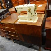 Bernina Record electric sewing machine in housing unit