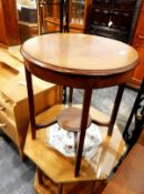 Octagonal magazine table with decorative bead and marble panel to top over an open stage with eight