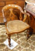 Victorian walnut armchair, with down swept arms, cane panel seat,