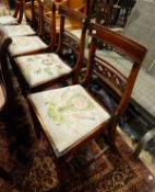Set of four dining chairs with diamond pierced crossrails, floral and bird tapestry cushions,