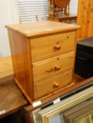 Pair of pine three-drawer bedside chests