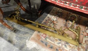 Victorian brass fender with rail end rests,