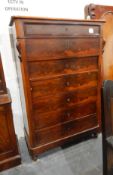 19th century French figured wood chest of six drawers on bun feet,