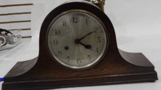 Mantel clock in oak case with silvered dial
