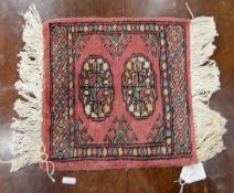 A Persian Qashqai prayer rug, a small Eastern style rug,