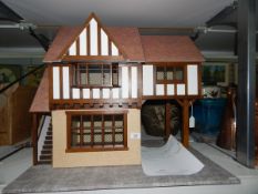 Elizabethan style half-timber dolls house with opening front