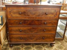 Victorian mahogany chest of four graduated drawers with cockbead borders and bun handles,
