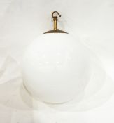 Pair of spherical white glass ceiling lights with brass fittings