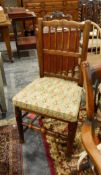 Set of six Lancashire spindleback dining chairs, rush seated, united by H-stretchers,