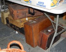 Two pig skin leather suitcases,