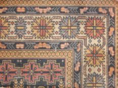 A Persian style runner with grey and red ground, cream borders, geometric pattern,