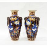 Pair of Japanese baluster vases, each decorated with flowers on a brown ground,