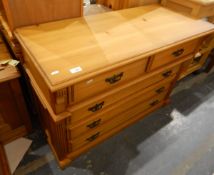 Modern pine chest of two short and three long drawers, having Edwardian-style brass handles,