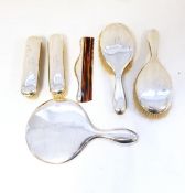 George V silver-backed dressing table set of six pieces viz:- hand mirror, pair of brushes,