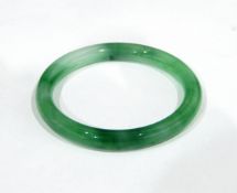 Green glass bangle of mottle design to resemble jade