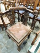 19th century oak corner hall chair with floral and scroll top rail, vase-shaped supports,