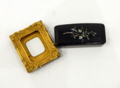 Victorian papier mache snuffbox of rectangular form and mother-of-pearl floral inlay and a small