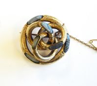 A Victorian gold coloured metal and agate knot brooch, 3.